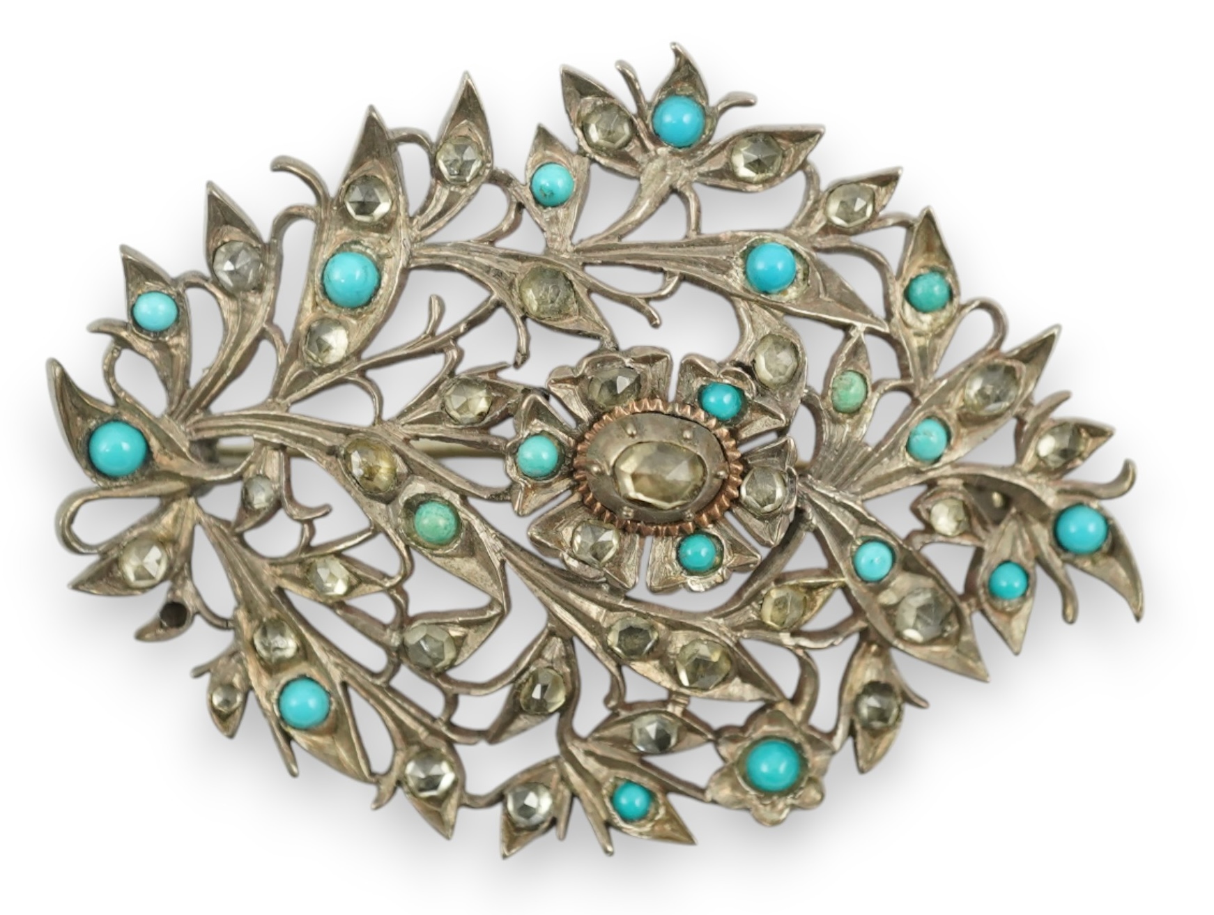 An Indian yellow and white metal, turquoise and simulated diamond set leaf brooch, 60mm. Condition - fair